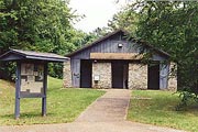 a picture of one of the buildings, and the wide handicapped accessible path, at Clark Creek North Campground, Lake Allatoona